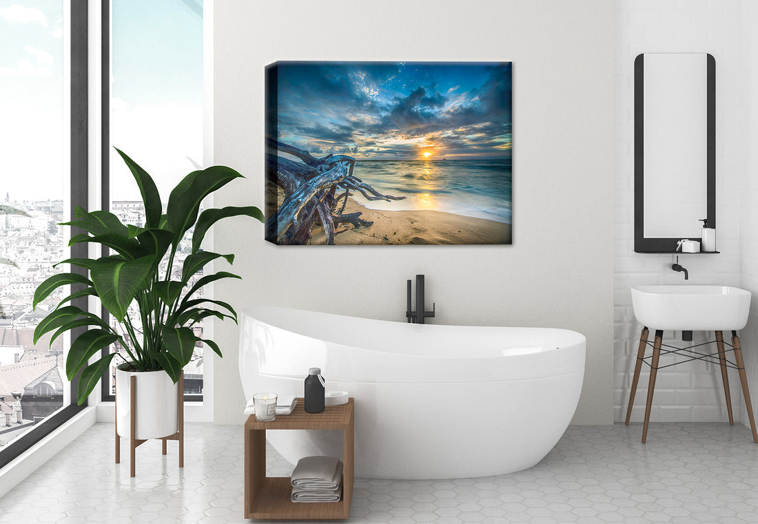 Photo of a large driftwood on the beach with a a sunset - printed on Canvas - Hanging on Bathroom Wall
