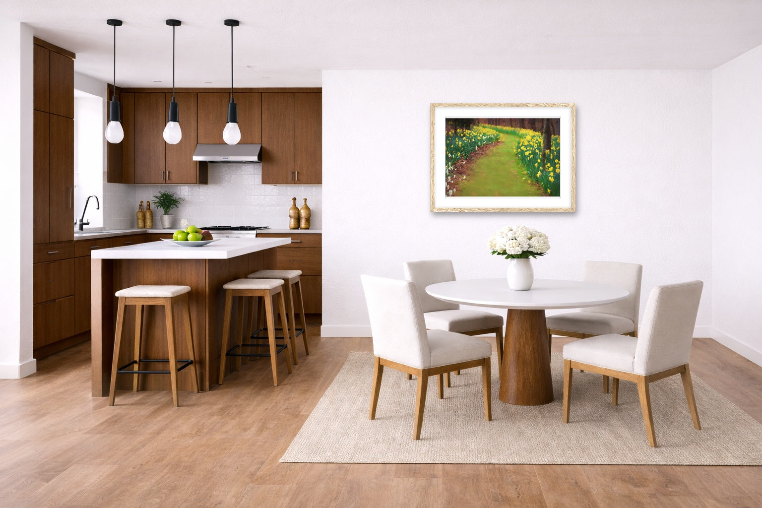 Oak-framed wall art hanging in a modern kitchen and dining area with wooden floor, and white walls