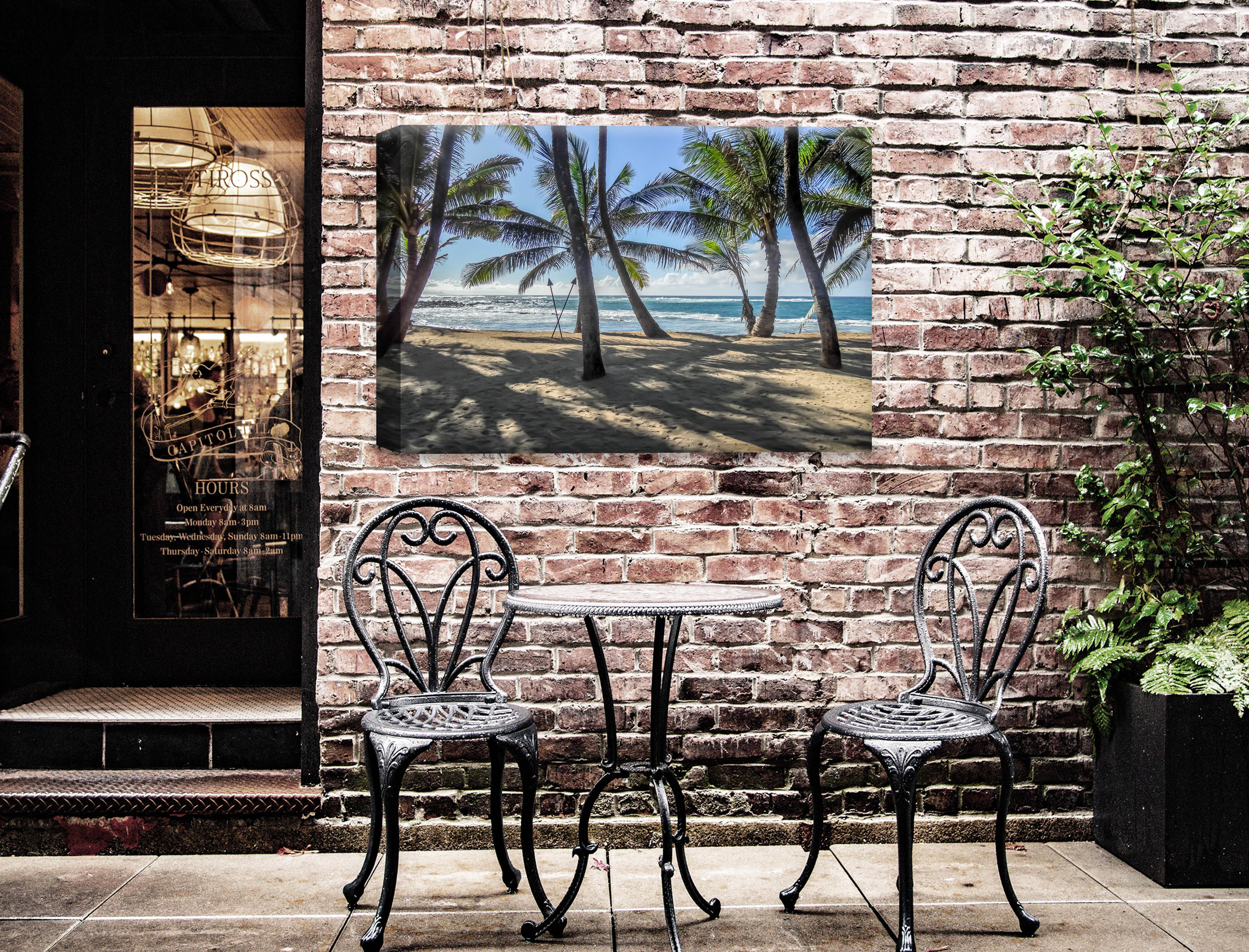 Palm Tree Art - Canvas wraps on a brick wall outside a restaurant. 