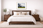 Black Church - Iceland printed on fine art paper, framed in a oak frame and matted. Hung on a bedroom wall.