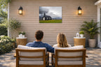 Black Church - Iceland printed on water resistant canvas and mounted on a waterproof frame. Hung on a patio wall with couple.
