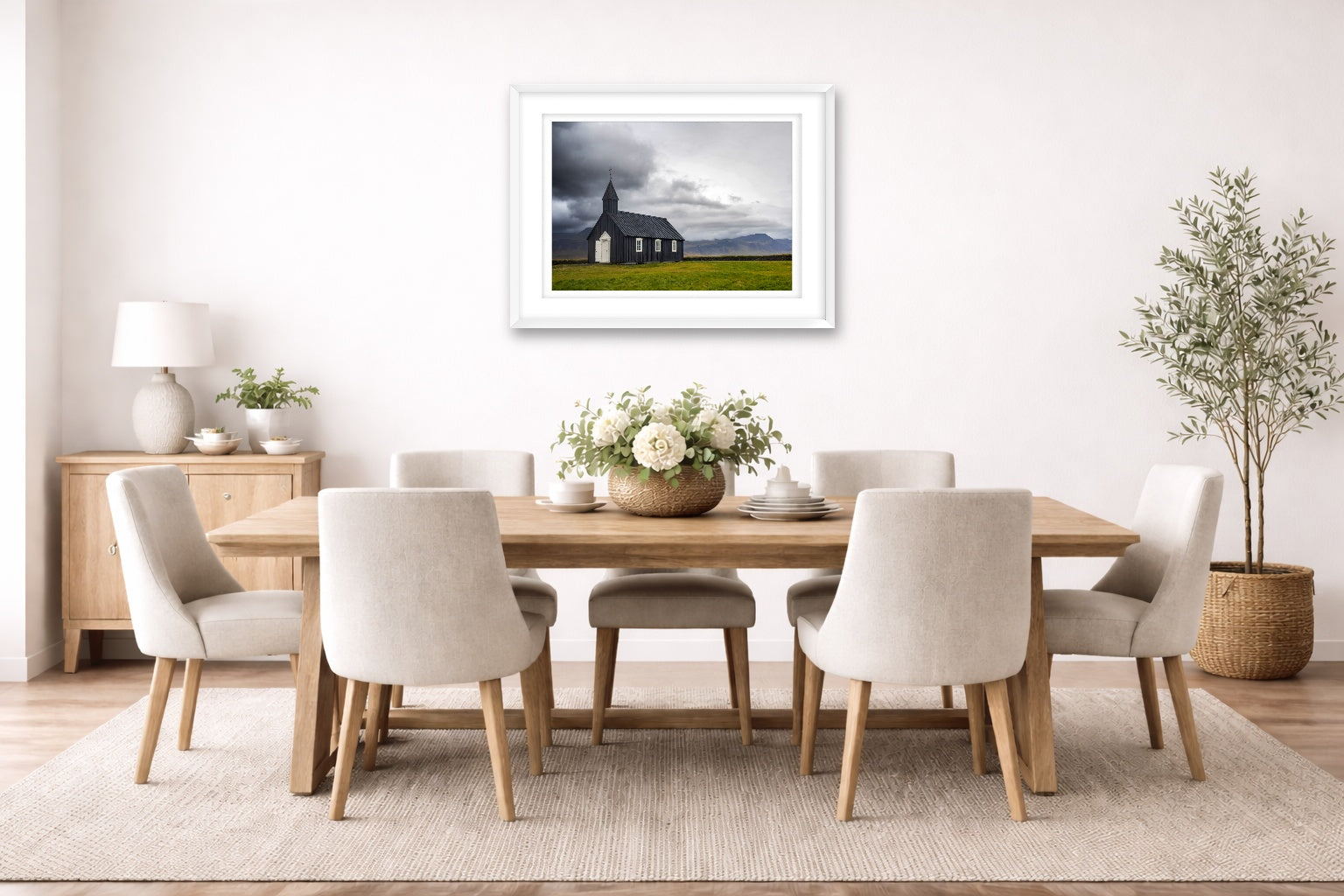 Black Church - Iceland printed on fine art paper, framed on a white frame and matted. Hung on a dining room wall.