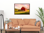 Painting of a Red Barn standing on a Field.  Printed on Waterproof Canvas with Brown Frame Hanging on Living Room Wall with Beige Couch