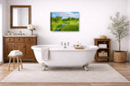 Green fairway at the 15th hole of Muirfield Village Golf Club printed on canvas wall art displayed on a bathroom wall .