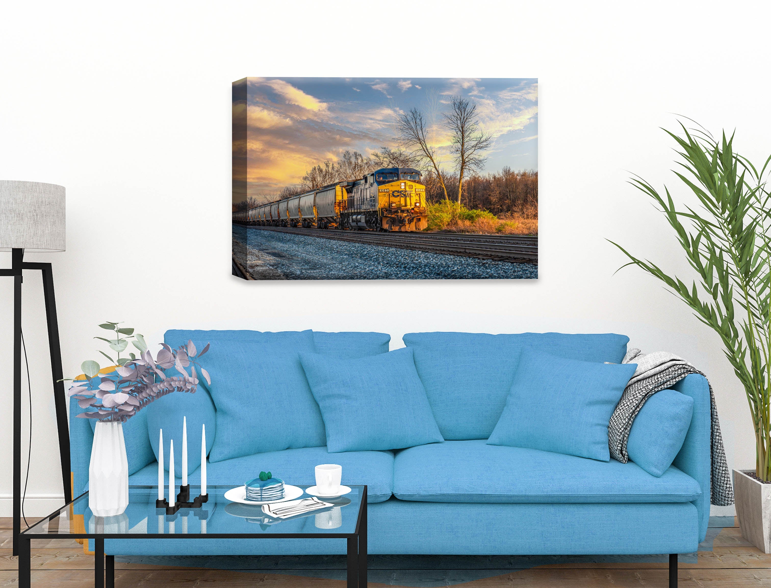 Train at Sunset - Canvas Wrap on Living Room Wall - Blue Sofa