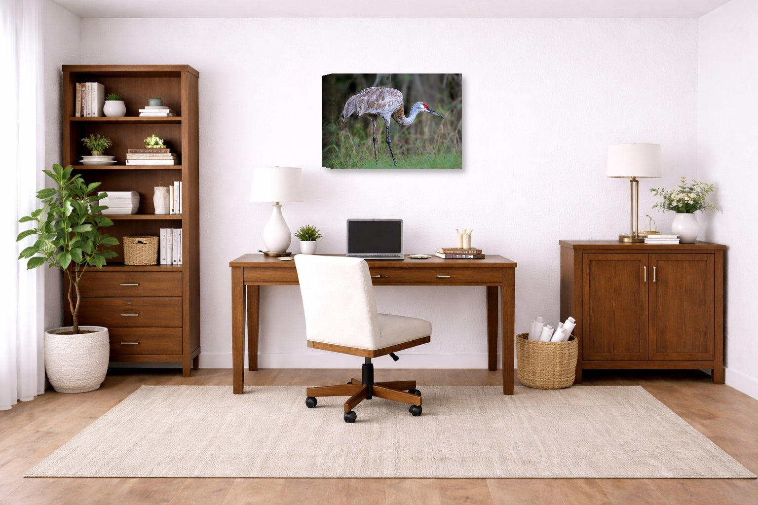 Majestic sandhill crane standing in Grass printed on canvas wall art displayed on a wall in a a home office.