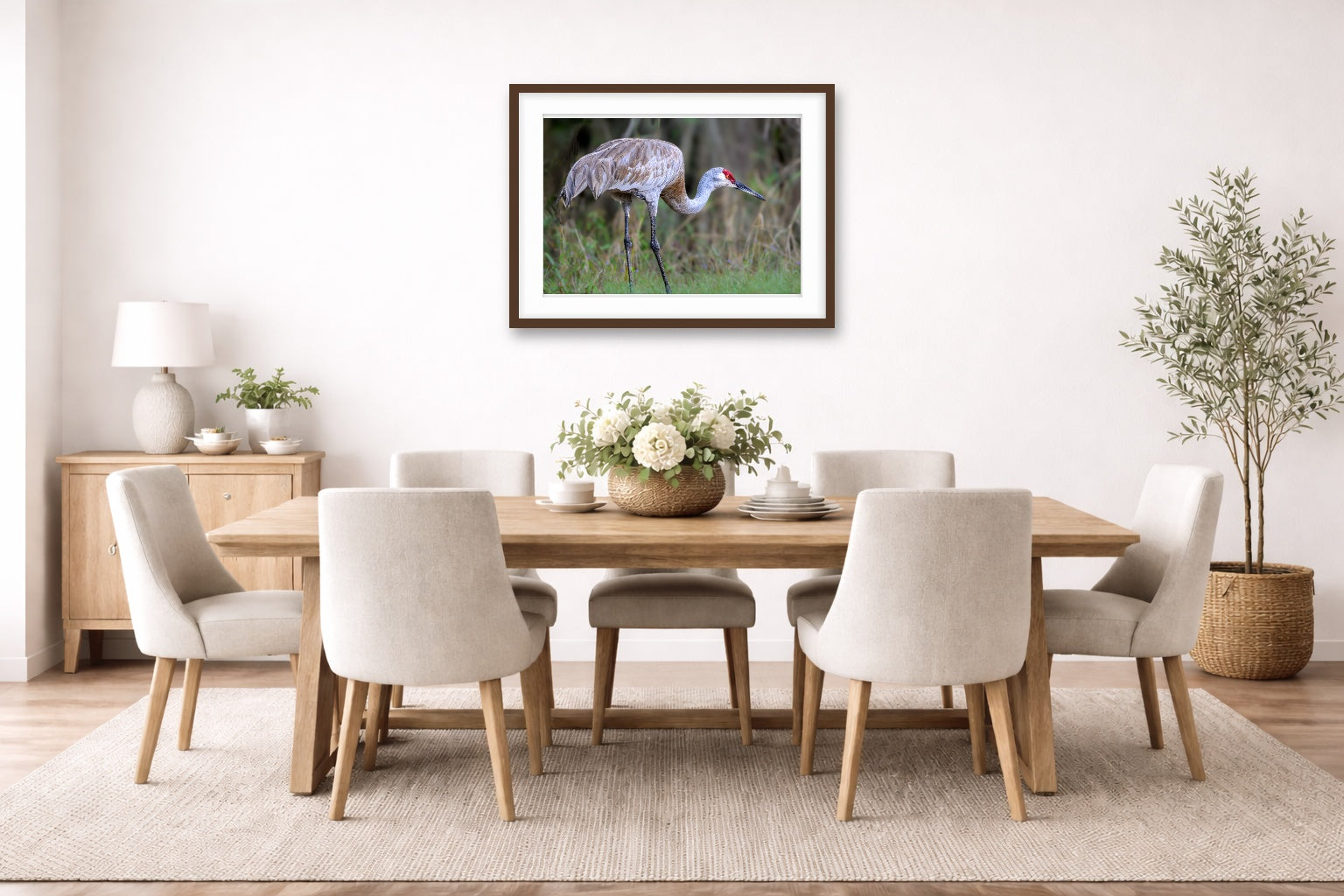 Majestic sandhill crane standing in Grass printed on fine art paper, framed on a espresso frame and matted. Hung on a dinning room wall