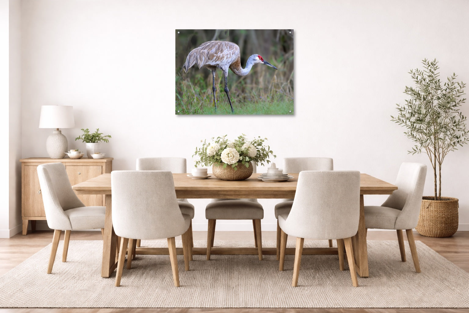 Majestic sandhill crane standing in Grass printed on aluminum metal with wall anchors. Hung on a dining room wall.