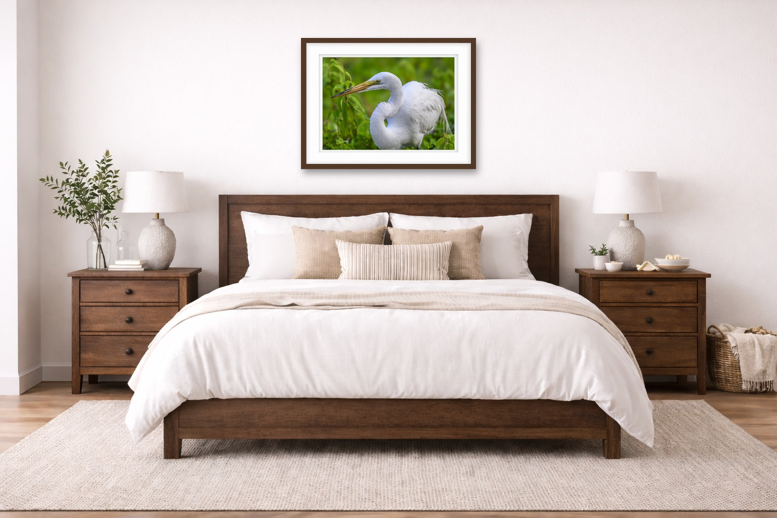 White Egret in Flight printed on fine art paper, framed on a espresso frame and matted. Hung on a living bedroom wall.