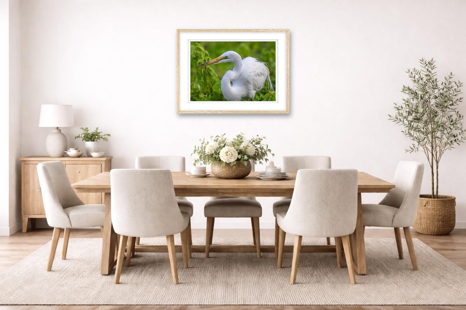 White Egret in Flight printed on fine art paper, framed on a oak frame and matted. Hung on a dining room wall.