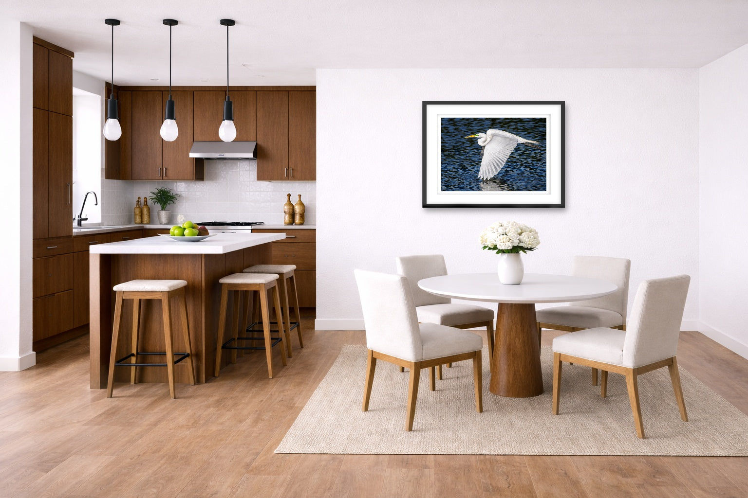 White Egret in Flight printed on fine art paper, framed on a black frame and matted and hung on a wall on a dinette wall.