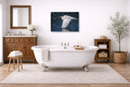 White Egret in Flight printed on canvas wall art displayed on a bathroom wall .