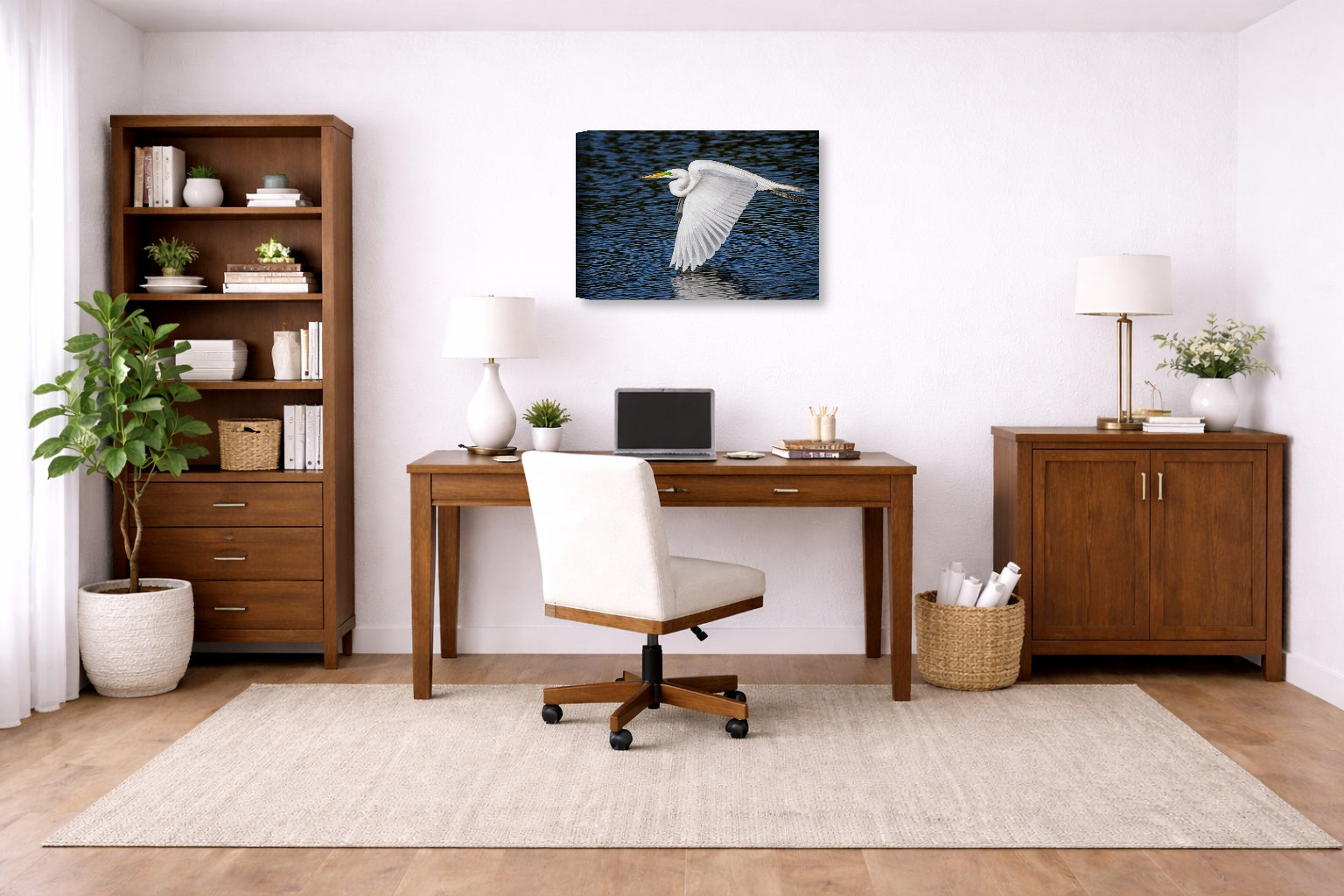 White Egret in Flight printed on canvas wall art displayed on a wall in a a home office.