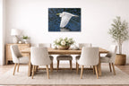 White Egret in Flight printed on aluminum metal with wall anchors. Hung on a dining room wall.