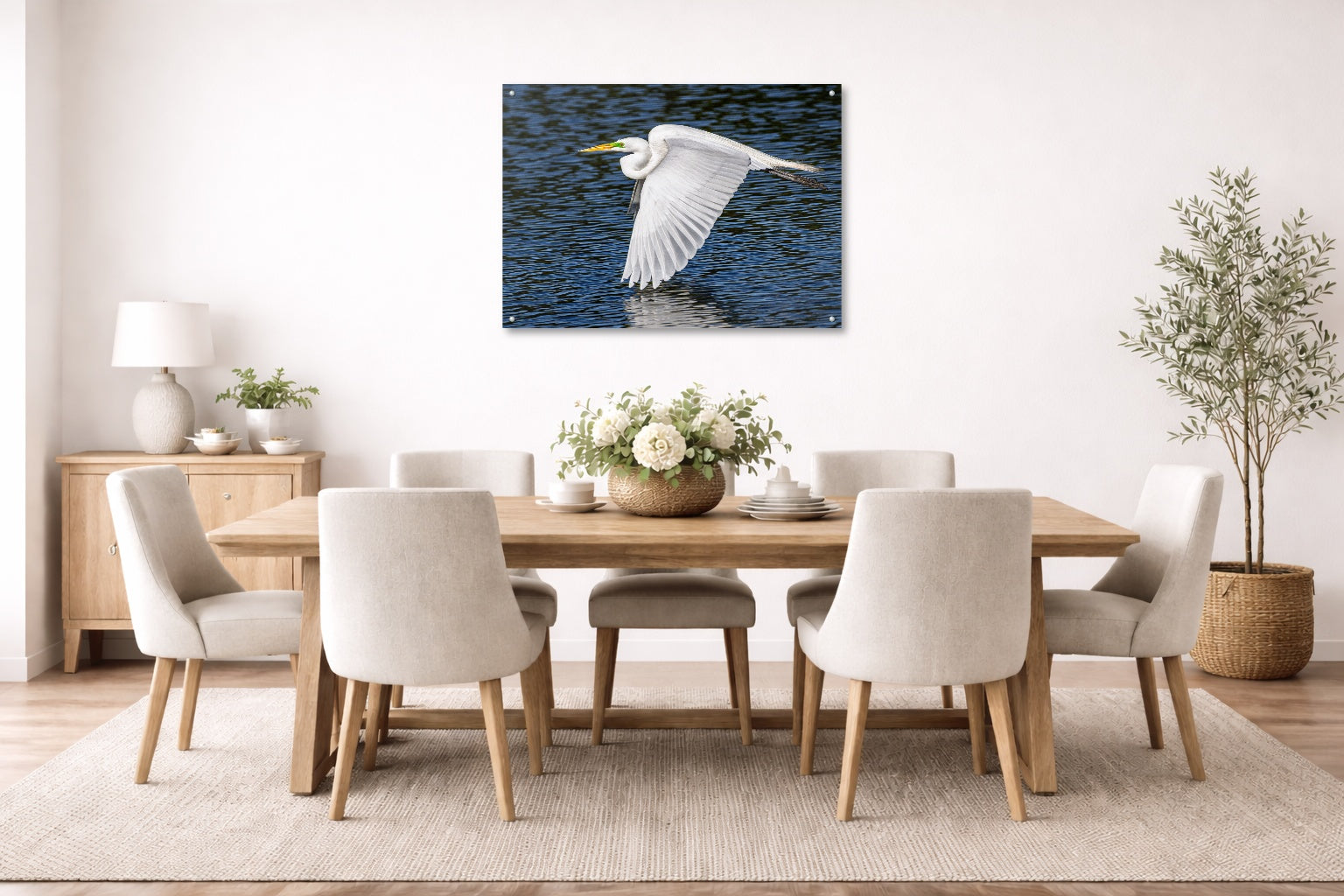 White Egret in Flight printed on aluminum metal with wall anchors. Hung on a dining room wall.