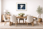 White Egret in Flight printed on fine art paper, framed on a oak frame and matted. Hung on a dining room wall.