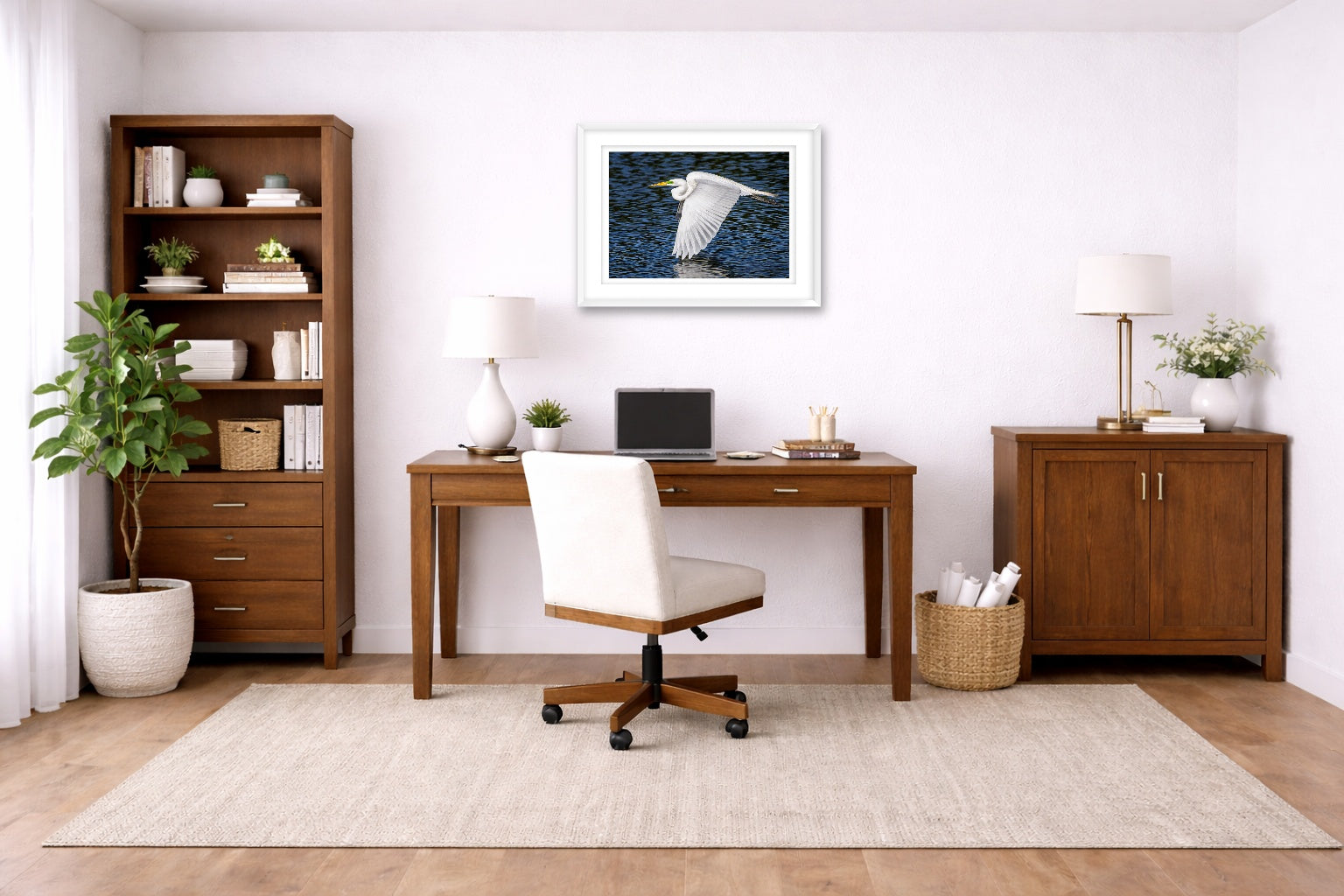 White Egret in Flight printed on fine art paper, framed on a white frame and matted. Hung on a home office wall.
