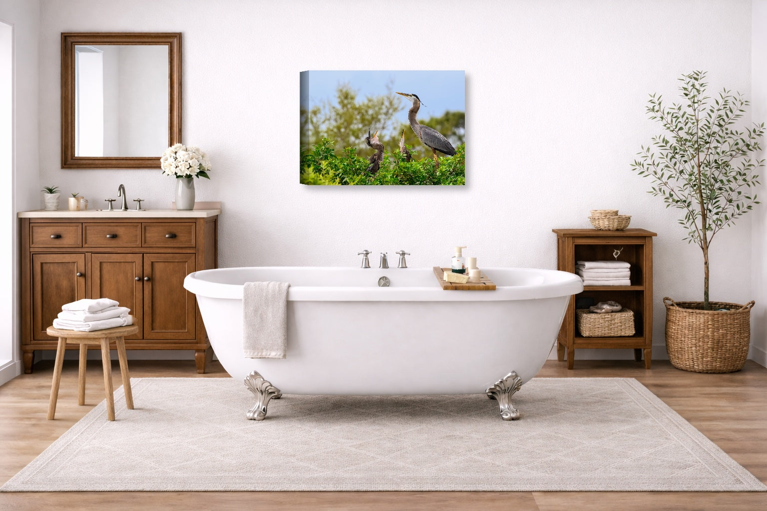 Blue Herons with Chicks printed on canvas wall art displayed on a bathroom wall .