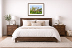 Blue Herons with Chicks printed on fine art paper, framed on a espresso frame and matted. Hung on a living bedroom wall.