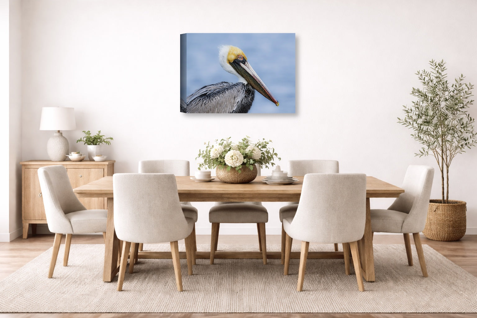 Pelican Posing against a blue sky printed on canvas wall art displayed on a wall in the dinning room