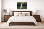 Night Heron Posing printed on canvas wall art displayed on a wall above a bed.