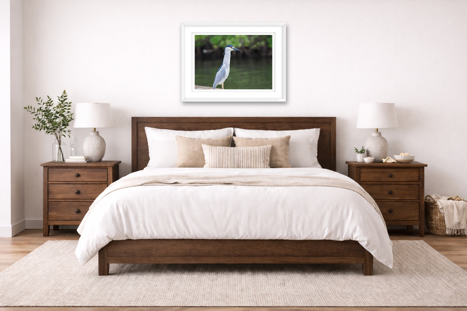 Night Heron Posing printed on fine art paper, framed on a white frame and matted. Hung on a bedroom room wall