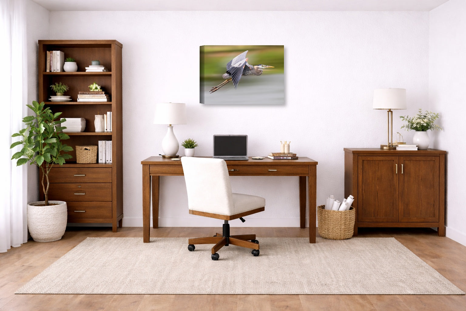 Blue Heron in Flight printed on canvas wall art displayed on a wall in a a home office.