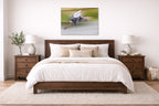 Blue Heron in Flight printed on aluminum metal with wall anchors. Hung on a bedroom wall.