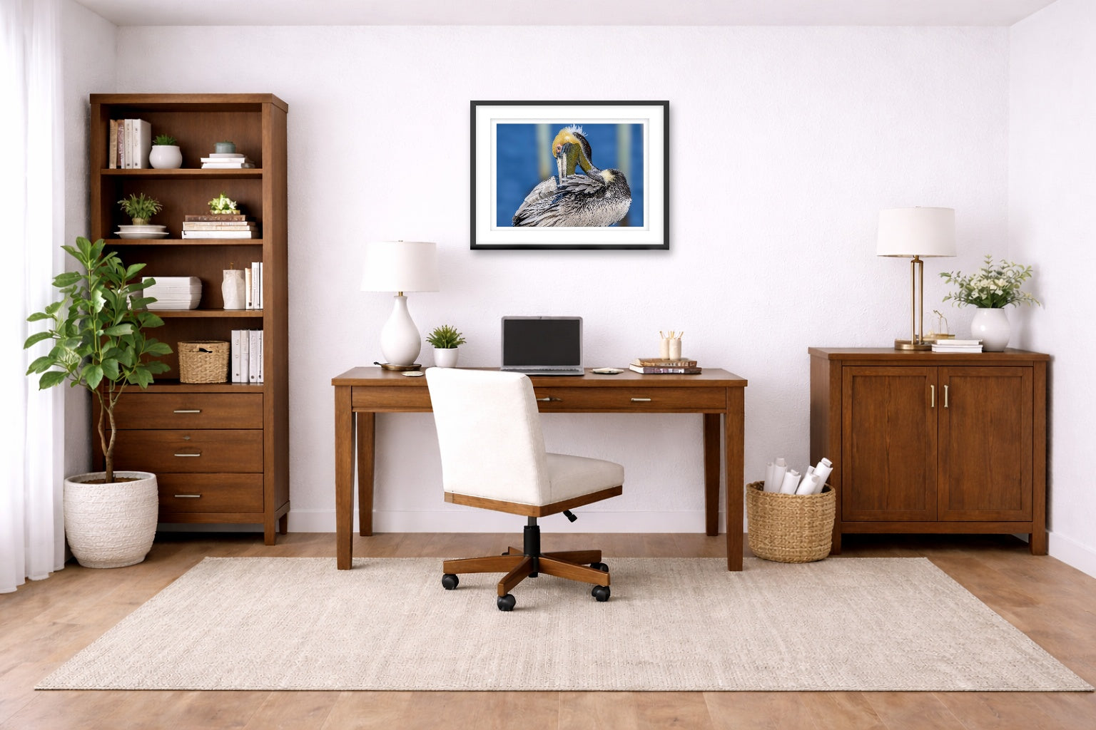 Preening Pelican printed on fine art paper, framed on a black frame and matted and hung on a wall on an home office wall.