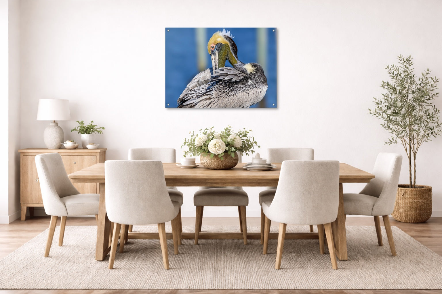 Preening Pelican printed on aluminum metal with wall anchors. Hung on a dining room wall.