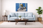 Preening Pelican printed on aluminum metal with wall anchors. Hung on a living room wall.