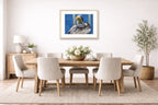 Preening Pelican printed on fine art paper, framed on a oak frame and matted. Hung on a dining room wall.