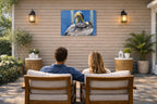 Preening Pelican printed on water resistant canvas and mounted on a waterproof frame. Hung on a patio wall with couple.