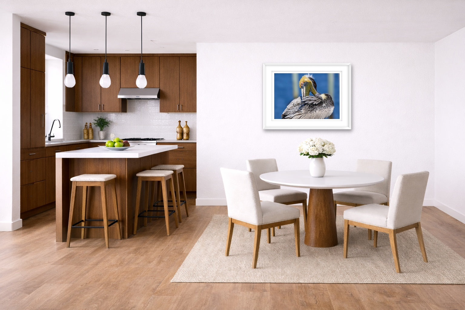 Preening Pelican printed on fine art paper, framed on a white frame and matted. Hung on a kitchen-dinette wall.
