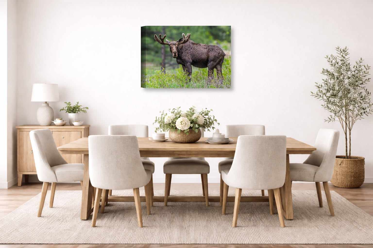 Moose in the Rockies printed on canvas wall art displayed on a wall in the dinning room