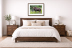 Moose in the Rockies printed on fine art paper, framed on a espresso frame and matted. Hung on a living bedroom wall.