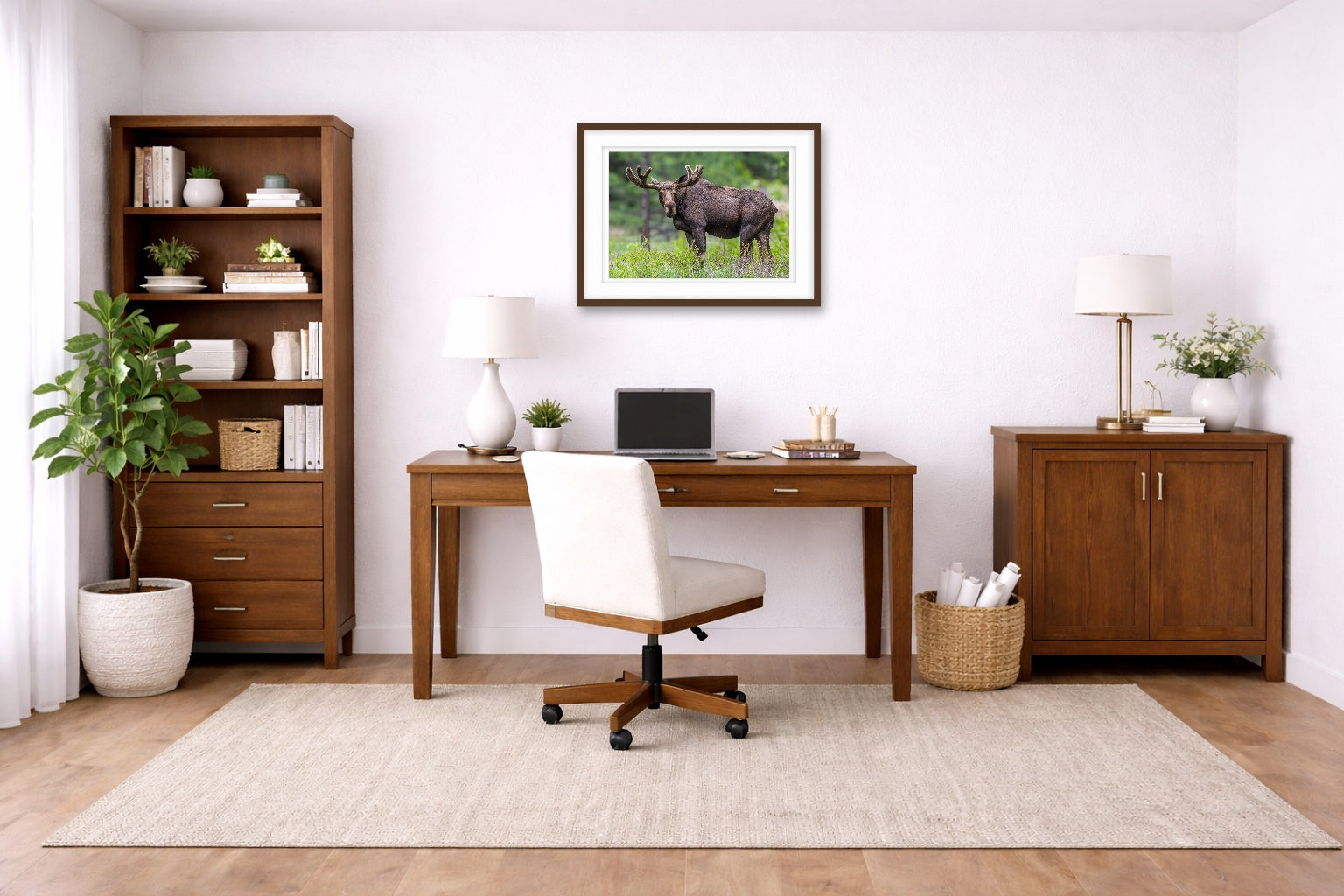 Moose in the Rockies printed on fine art paper, framed on a espresso frame and matted. Hung on a living home office wall.