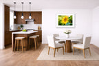 Petals of Gold - Sunflower printed on fine art paper, framed on a white frame and matted. Hung on a kitchen-dinette wall.
