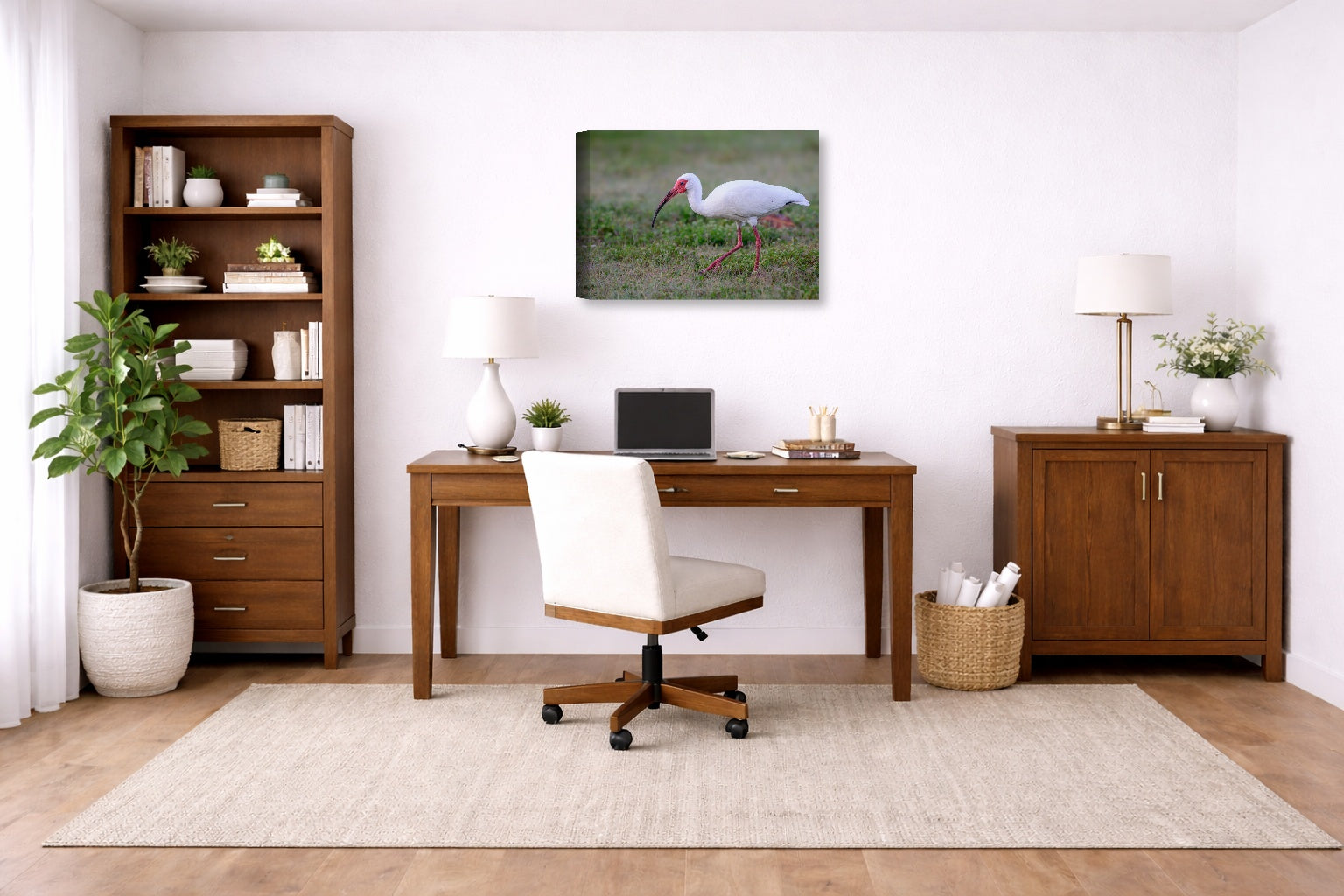 Ibis Walking in the Grass printed on canvas wall art displayed on a wall in a a home office.