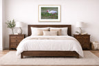 Ibis Walking in the Grass printed on fine art paper, framed in a oak frame and matted. Hung on a bedroom wall.