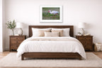 Ibis Walking in the Grass printed on fine art paper, framed on a white frame and matted. Hung on a bedroom room wall