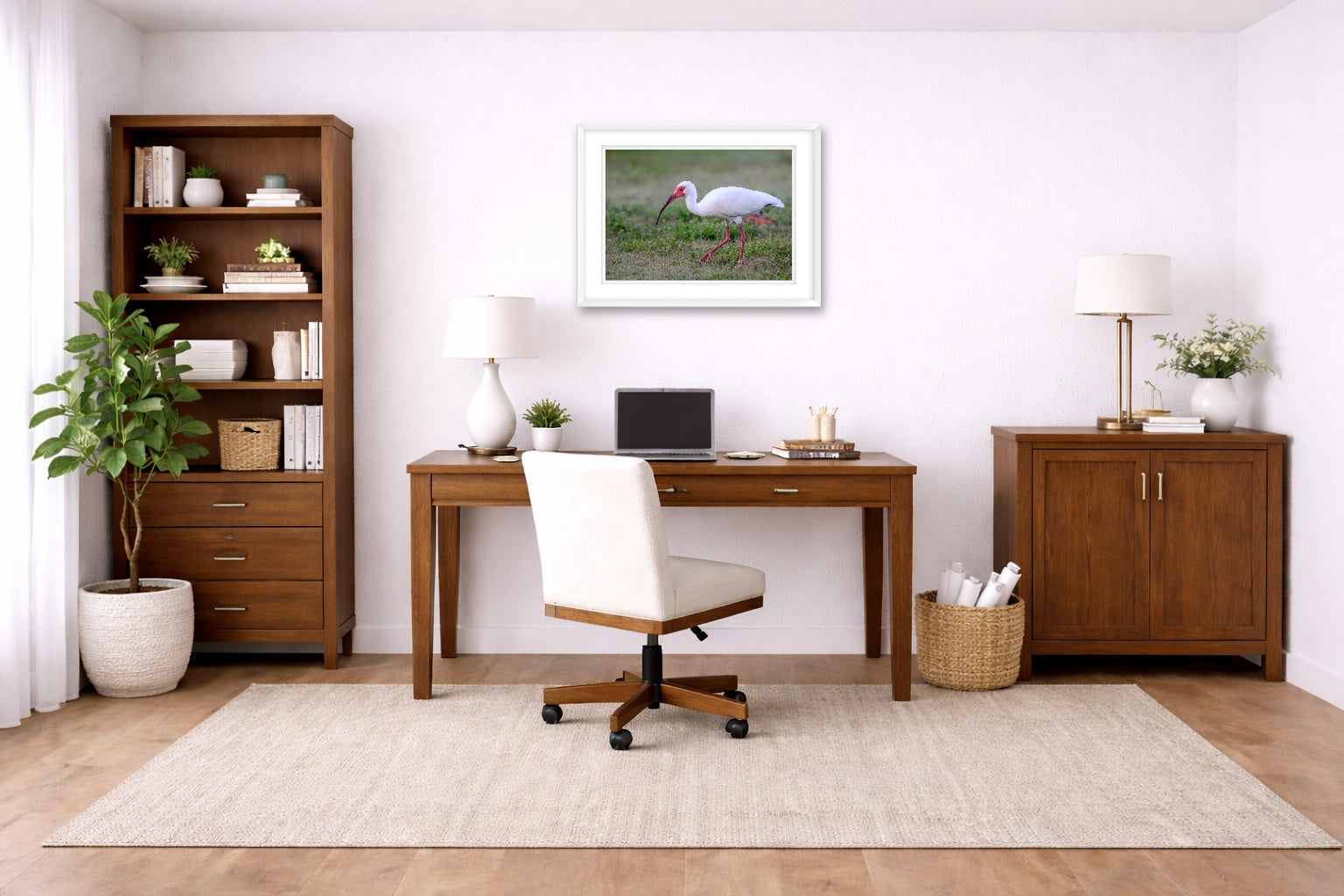 Ibis Walking in the Grass printed on fine art paper, framed on a white frame and matted. Hung on a home office wall.