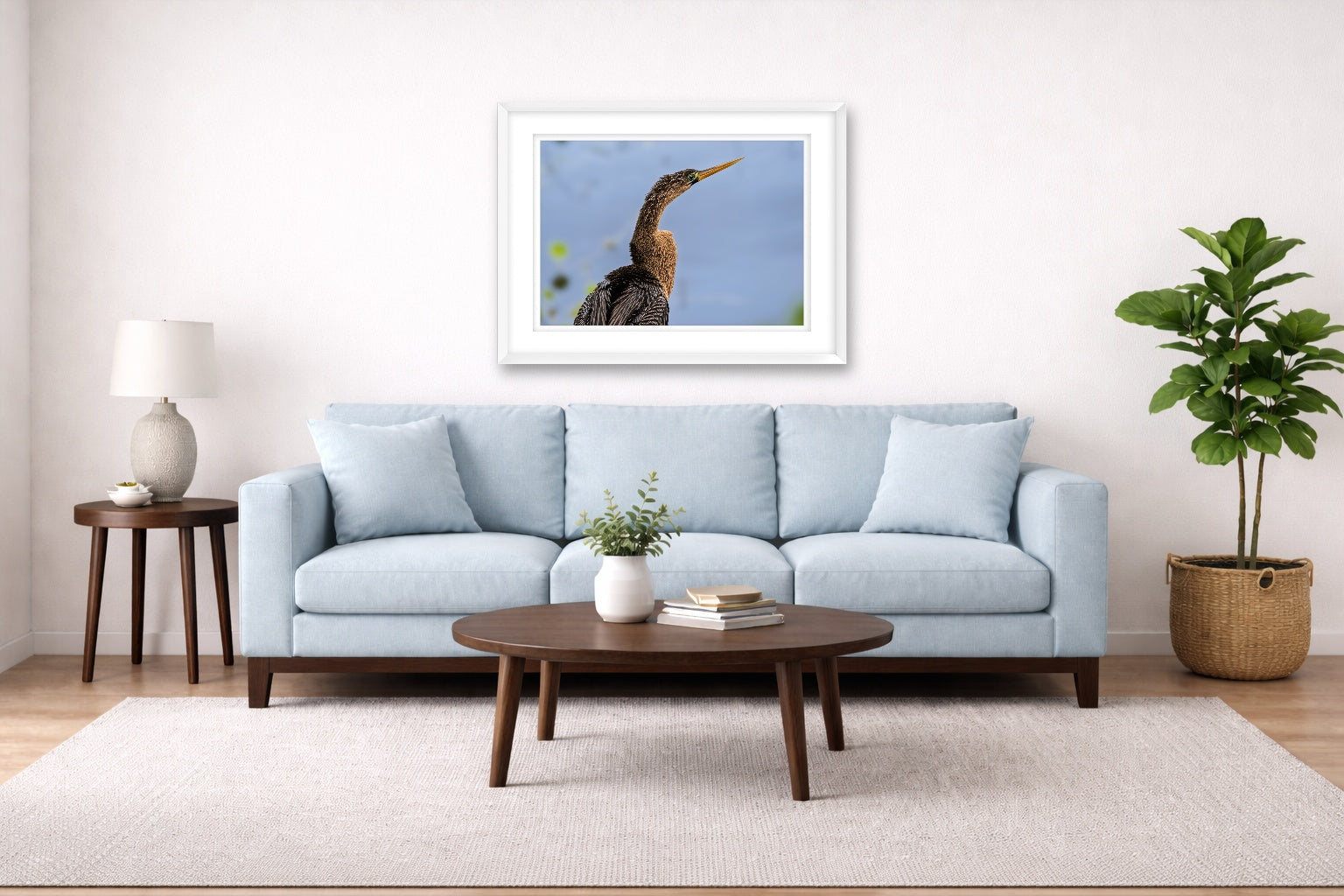 Patient Hunter - Anhinga printed on fine art paper, framed on a white frame and matted. Hung on a living room wall.