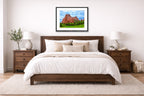 North Gateway Rock: Garden of the Gods printed on fine art paper, framed on a black frame and matted and hung on a wall on an bedroom wall.