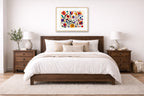 Colorful Geometric Abstract Botanical printed on fine art paper, framed in a oak frame and matted. Hung on a bedroom wall.