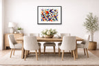 Geometric Bird Painting printed on fine art paper, framed on a black frame and matted and hung on a dining room wall.
