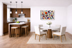 Geometric Bird Painting printed on canvas wall art displayed on a wall in a dinette.