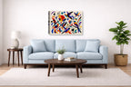 Geometric Bird Painting printed on canvas wall art displayed above a couch in a living room