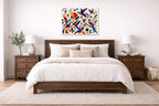 Geometric Bird Painting printed on aluminum metal with wall anchors. Hung on a bedroom wall.