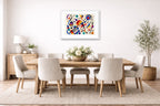 Geometric Abstract Musical Painting printed on fine art paper, framed on a white frame and matted. Hung on a dining room wall.